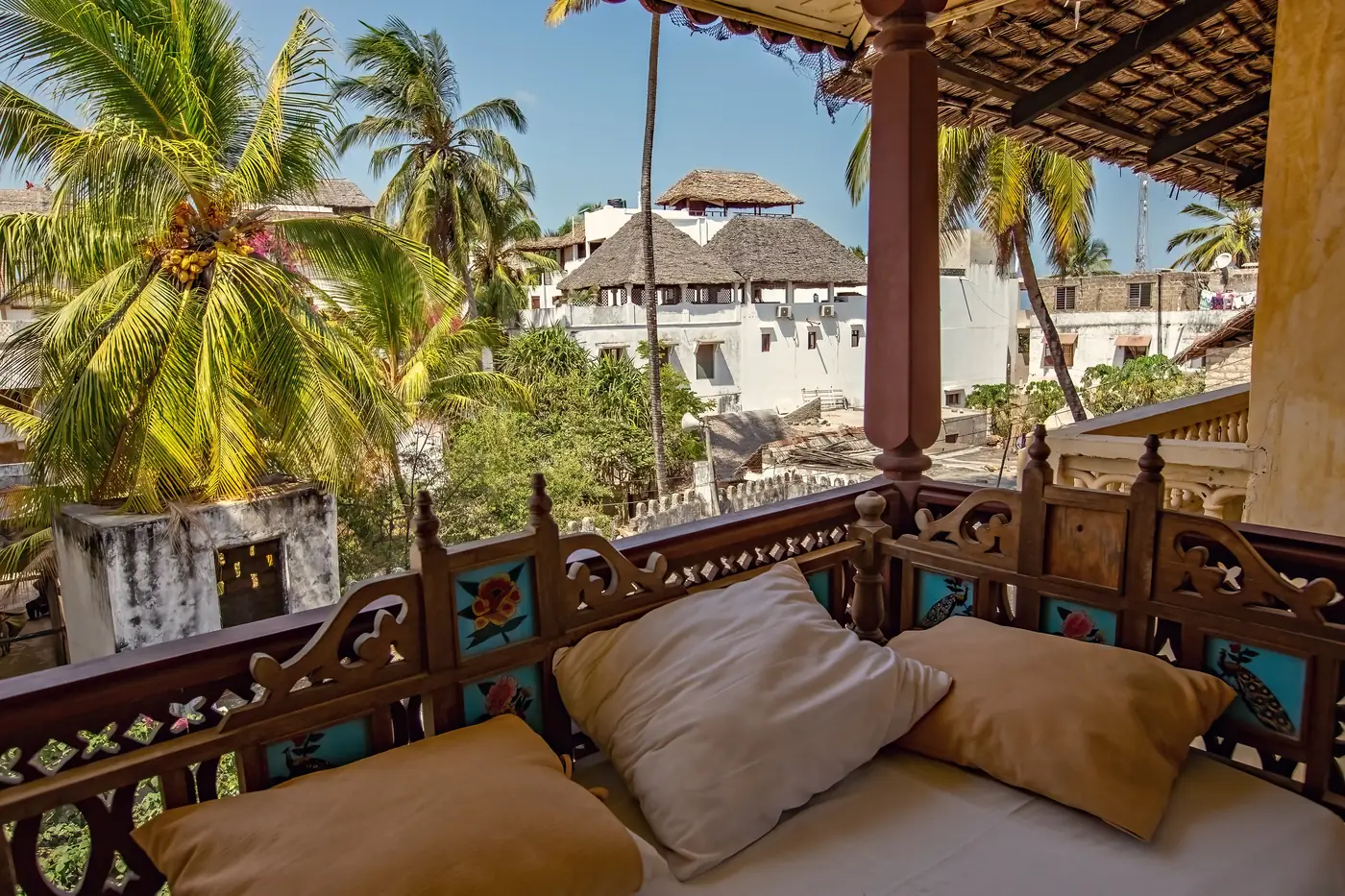 A bedroom open to the sea in a Swahili house on the Lamu waterfront