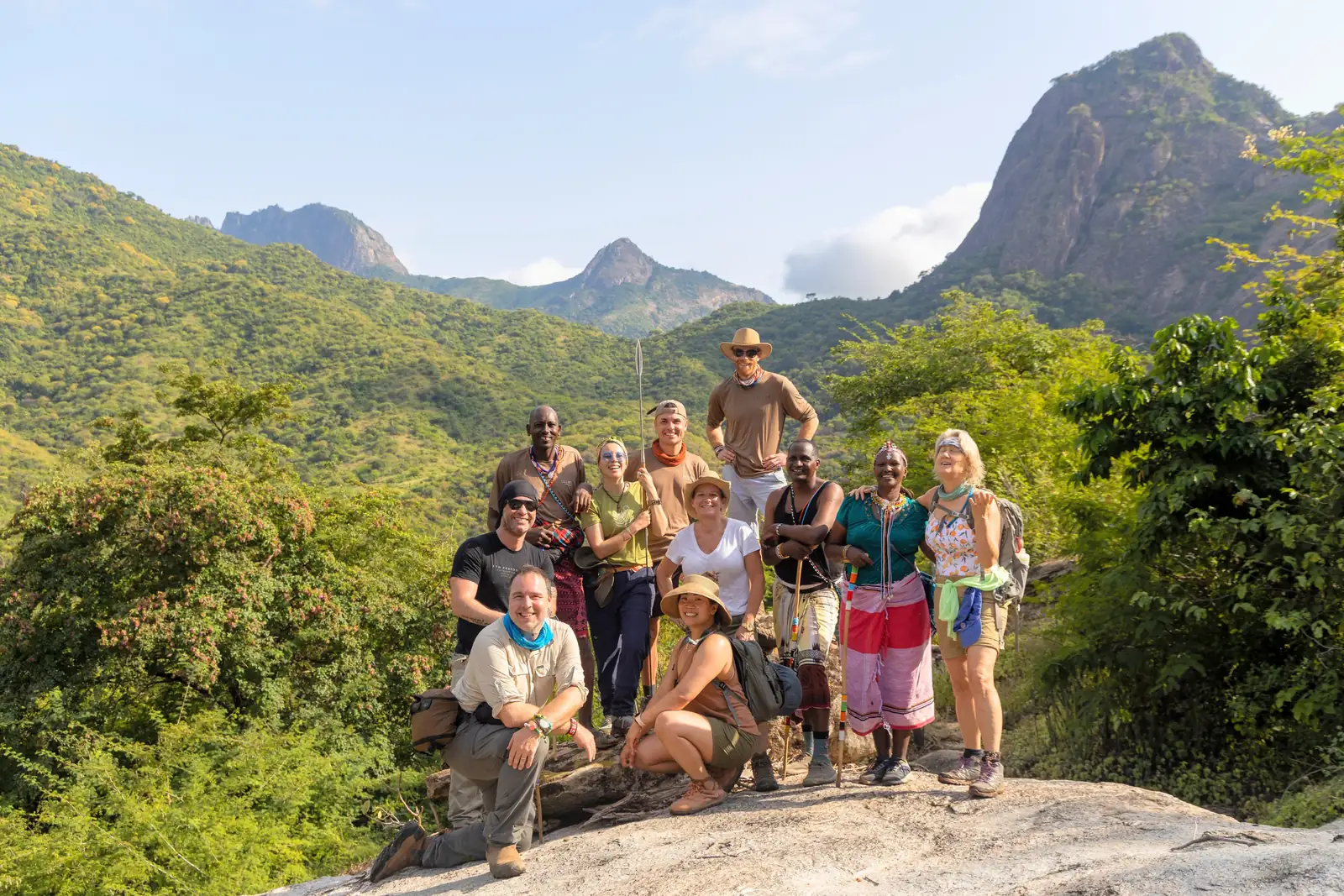 A travelling group with their Samburu guides on a summit in the Mathews Range